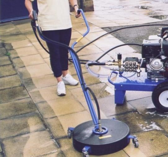 image shows: Driveway and patio cleaning in progress