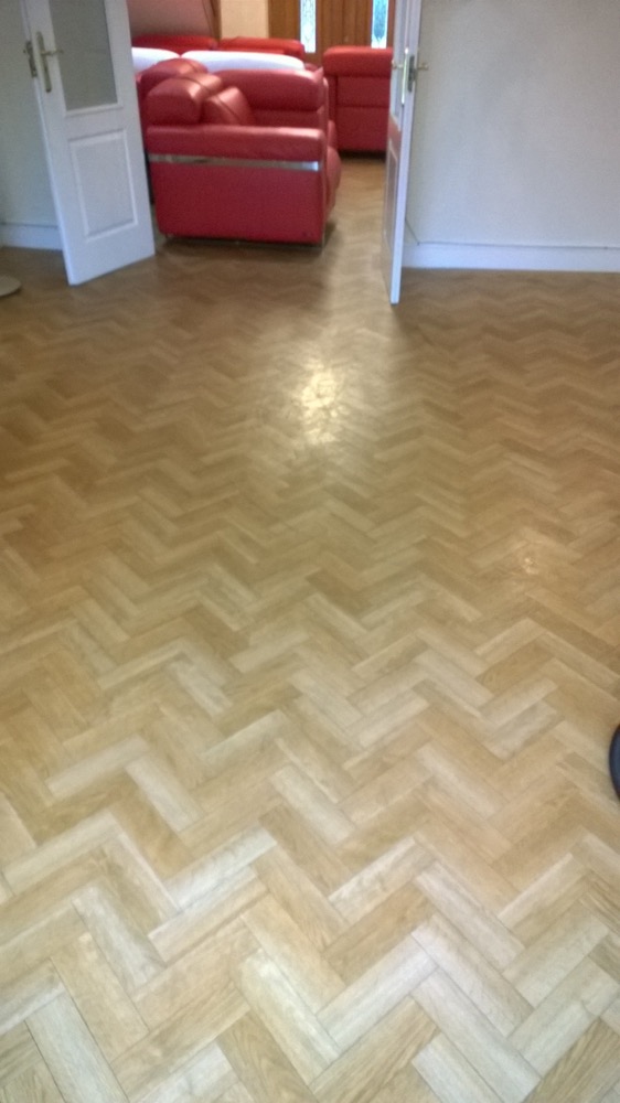 image shows: Cleaning Solid Wood, Engineered Wood and Parquet Tiled Flooring