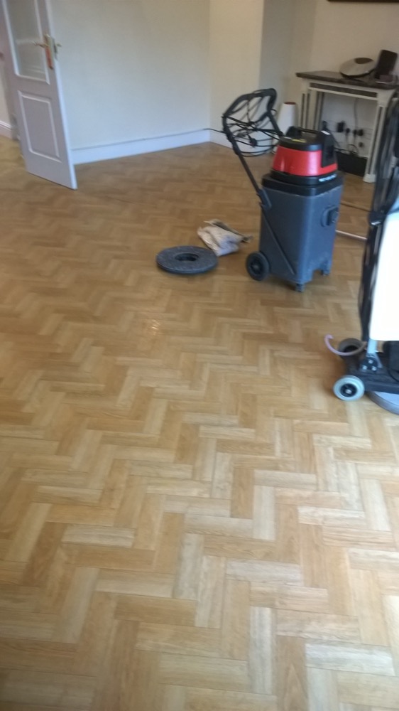 image shows: Cleaning Solid Wood, Engineered Wood and Parquet Tiled Flooring