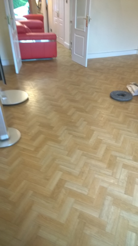 image shows: Cleaning Solid Wood, Engineered Wood and Parquet Tiled Flooring