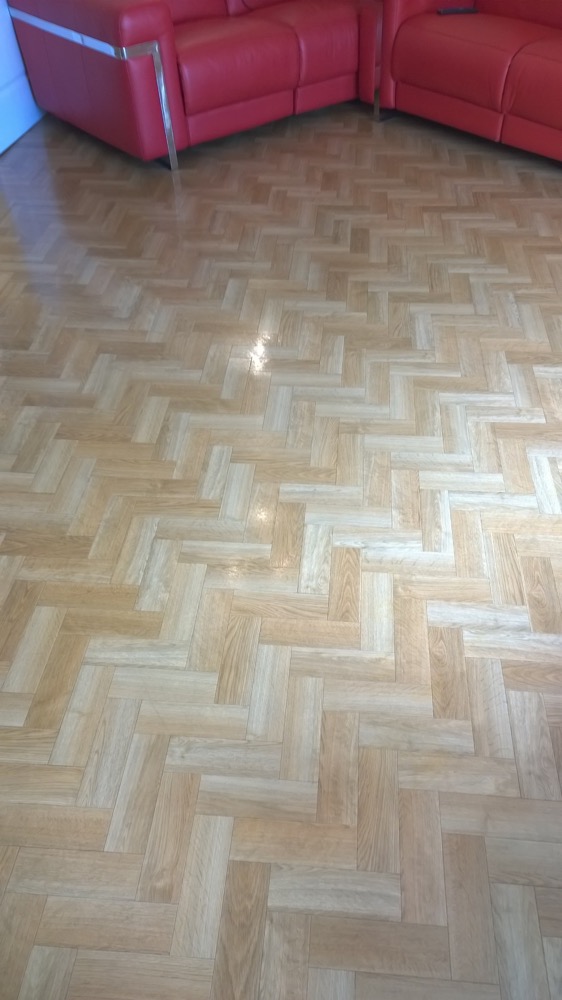 image shows: Cleaning Solid Wood, Engineered Wood and Parquet Tiled Flooring