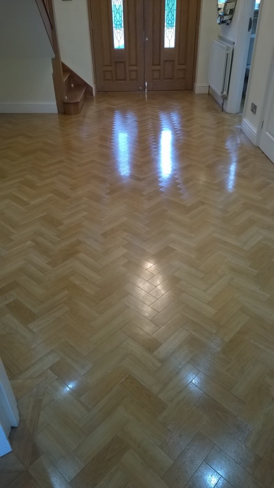 image shows: Cleaning Solid Wood, Engineered Wood and Parquet Tiled Flooring